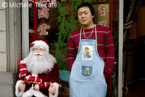 Babbo Natale con negoziante cinese